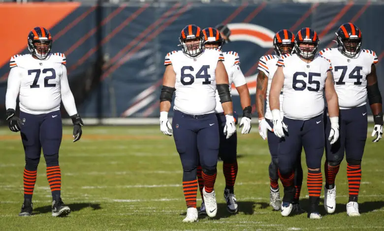 Charles Leno Jr. (72), center Alex Bars (64), center Cody Whitehair (65) and offensive guard Germain Ifedi (74) walk on the field during the first half of an NFL football game against the Houston Texans, Sunday, Dec. 13, 2020, in Chicago.