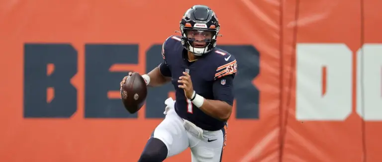 Justin Fields is leading the Bears with his arms and his feet today.