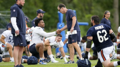 Matt Eberflus and DeMarcus Walker