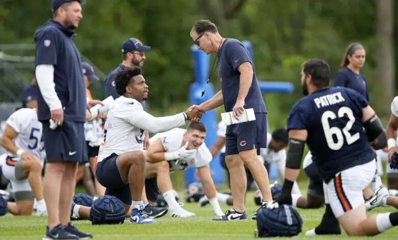 Matt Eberflus and DeMarcus Walker